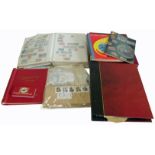 Carton of all world stamps in six albums or binders, plus a few covers and loose in tin and