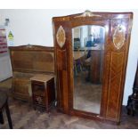 Early 20th century French pam bedroom suite with gilt metal decoration complete with wardrobe,