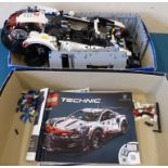 Lego Technic Porsche 911 (42096) partially assembled complete with booklet. Condition reports are