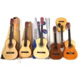 Six nylon strung guitars