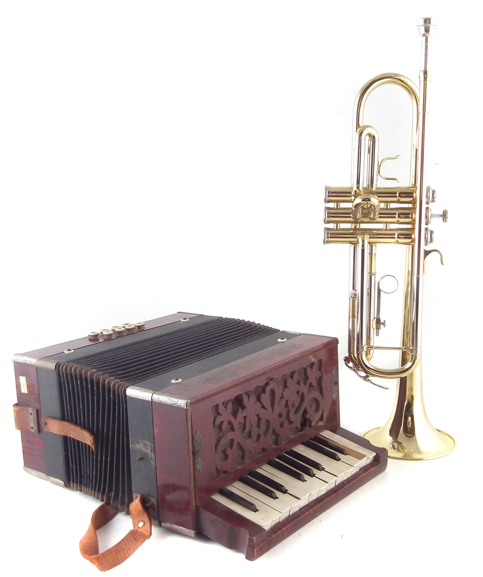 Odyssey trumpet in case and Rosetti piano accordion.