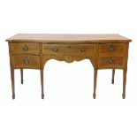 George III mahogany serpentine front sideboard.