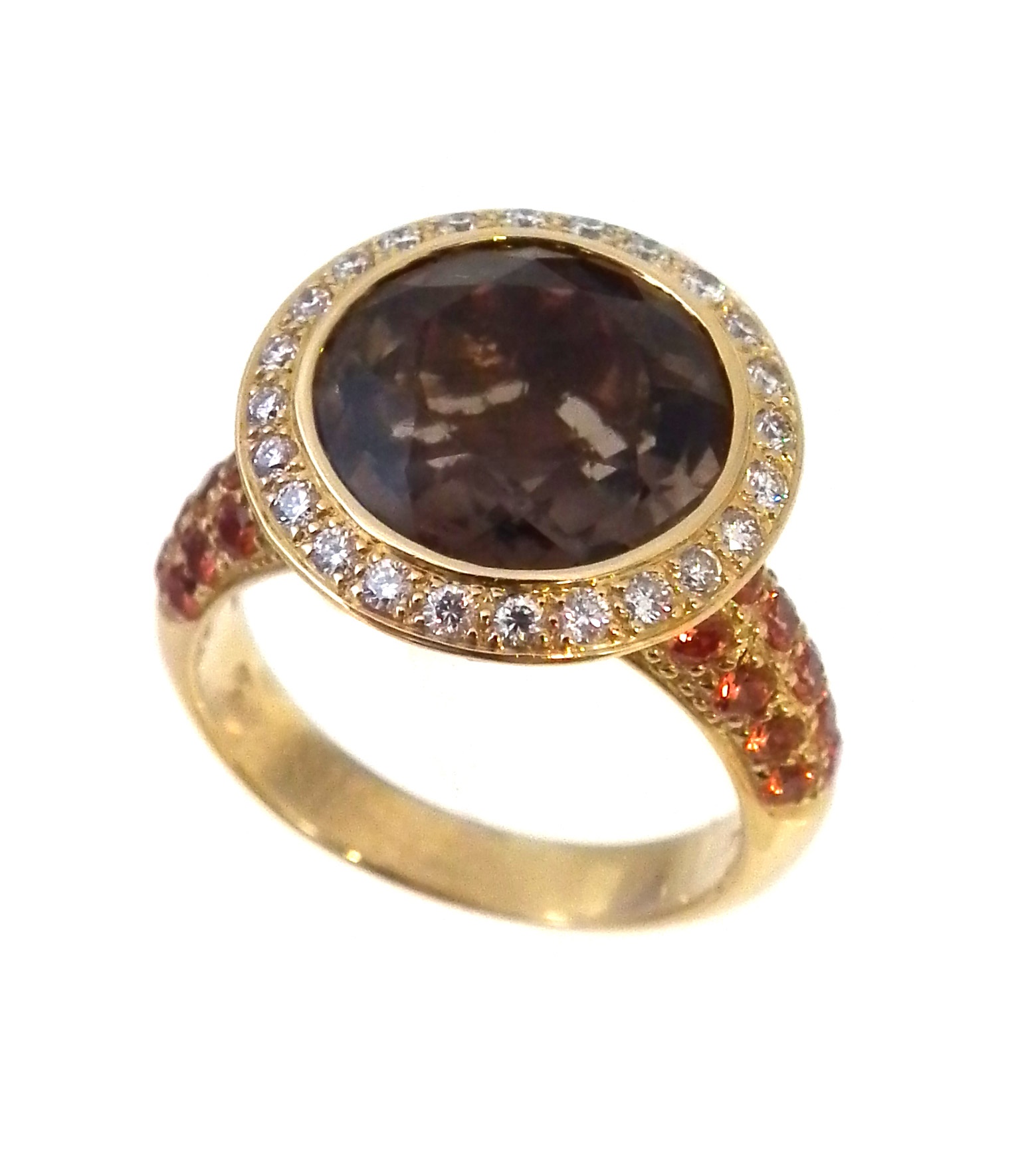 A smoky quartz diamond and topaz dress ring,