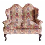 Queen Anne design two seater sofa by Gillows circa 1900.