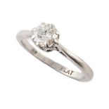 A diamond solitaire platinum ring,