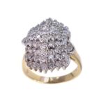 A diamond fancy cluster 18ct gold ring.