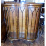 Early 20th century walnut double bow-fronted china cabinet on ball an claw feet 106cm wide Condition