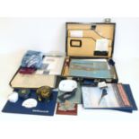 A collection of Concorde items including menu, place mats, certificates, magazines, ties and heart