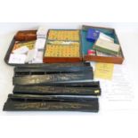 Cased "Mah-Jongg" complete with rule book 10 sets of playing cards, four ebonised oriental style