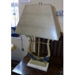 Modern lyre shaped table lamp complete with shade. Condition reports are not available for Interiors