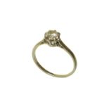 A diamond single stone ring, the brilliant cut diamond within an eight claw setting with tapered