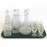 Six various cut glass decanters and eight wine glasses. Condition reports are not available for