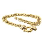 An 18ct gold chain bracelet, the graduated fancy link chain with textured and polished links to