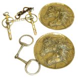Pair of embossed brass plaques depicting horses, 21cm diameter and two bits. Condition reports are