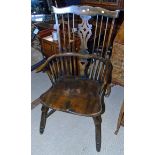 A pair of 20th comb back Windsor chairs Condition reports are not available for Interiors sales.