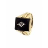 A 14ct gold onyx and diamond signet ring, the brilliant cut diamond inset to the rectangular onyx