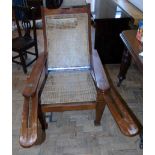 19th century teak planters chair with split cane back and seat Condition reports are not available