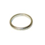 A band ring, with engraved detailing, stamped platinum, ring size I, gross weight 3.1g. Condition