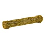 A filigree lipstick holder, the yellow metal filigree lipstick holder with tasselled caps to