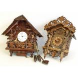 Modern black forest style cuckoo clock and one other clock Condition reports are not available for