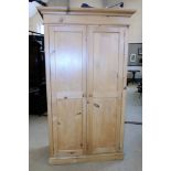 Modern pine two door hanging wardrobe 108cm wide 188cm tall and 56cm deep Condition reports are