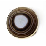 A Victorian banded agate brooch, the circular bull's eye banded agate cabochon within a yellow metal