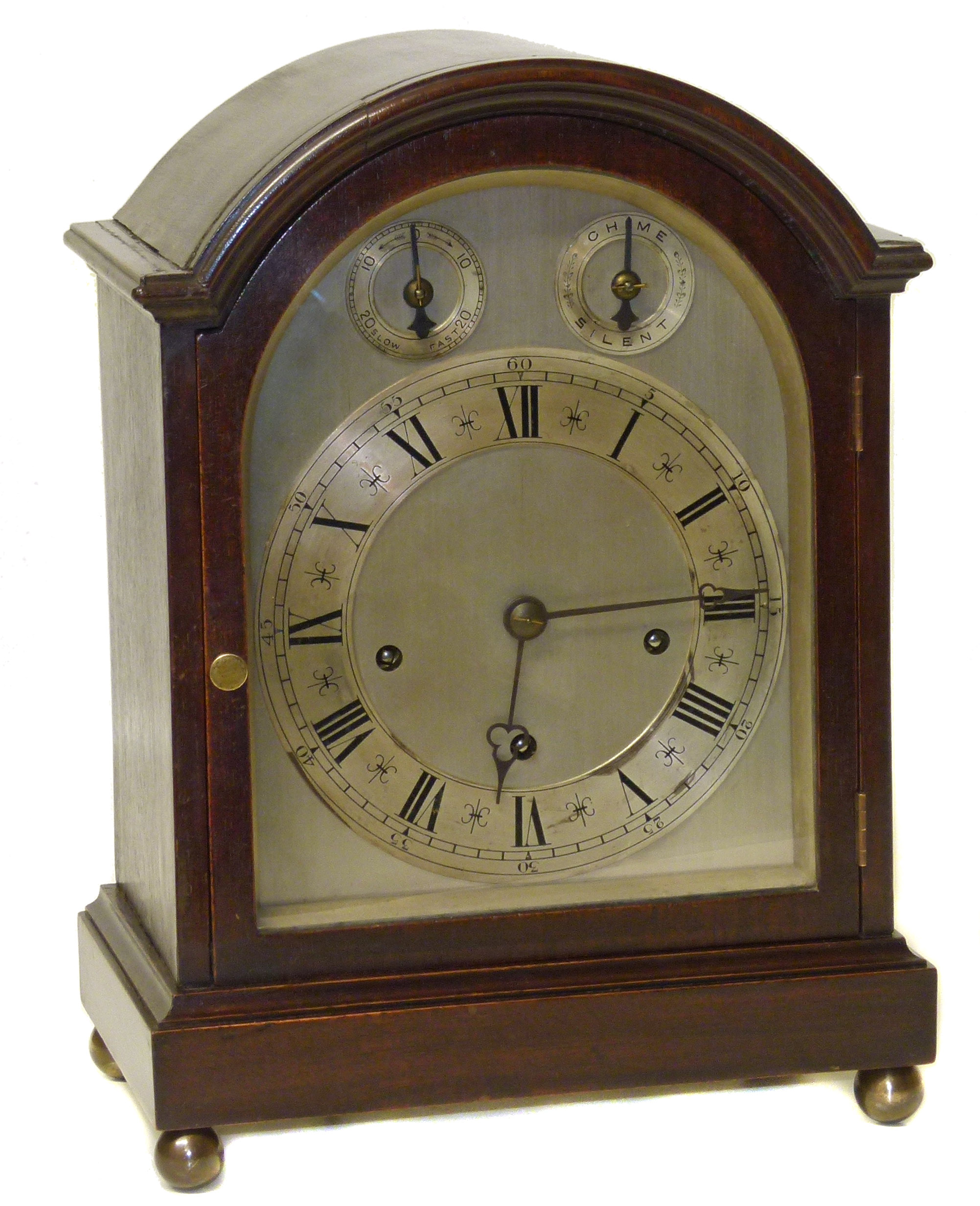 Early 20th century domed top bracket clock on ball feet. Condition reports are not available for