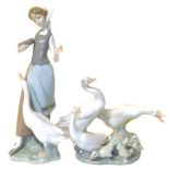 Lladro figure of a girl and a goose and three models of geese Condition reports are not available