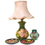 Moorcroft hibiscus lamp and small vase and two pin dishes Condition reports are not available for