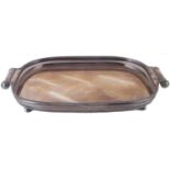 A large silver plated tray, of rounded rectangular shape, with pierced gallery sides gadroon rim and