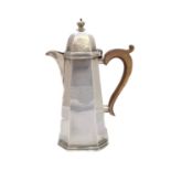 A 1920's silver hot water jug,