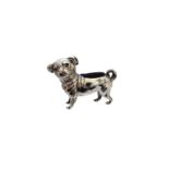 An early 20th Century novelty silver pug pin cushion,