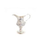 A George IV silver cream jug,