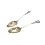 Two 19th Century silver berry spoons,