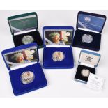 Five assorted Royal Mint cased silver proof coins (5).