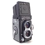 Rolleiflex twin lens camera, fitted with Tessar 1:3.5 f=75mm and Heidosmat 1:2.8 / 7mm mm lenses.