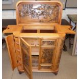 Oriental hardwood cocktail cabinet with carved panel Condition reports not available for this