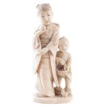 Japanese Ivory okimono, depicting a girl, boy with a ball and basket, a chick at the base, signed to