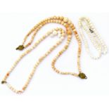 Three bleached coral bead necklaces, of varying design, gross weight 213g. Condition reports not