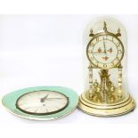 Domed Kundo 100 day clock and 1960's "Peter" ceramic wall clock Condition reports not available