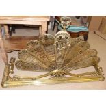 A brass fire kerb and a pierced brass fan shaped adjustable fire screen Condition reports not