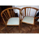 A pair of Edwardian oak corner chair Condition reports not available for this auction