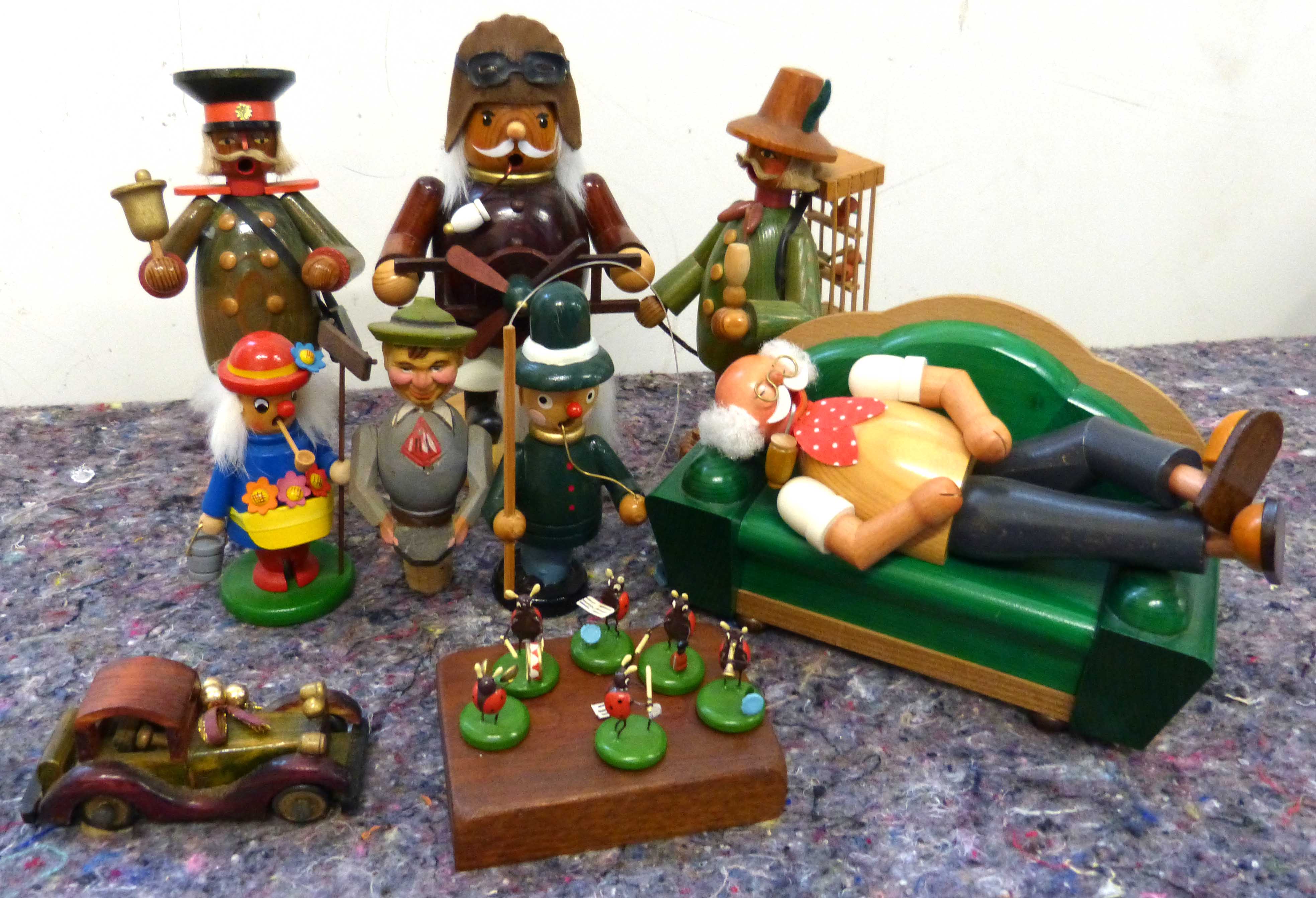 A collection of erzgebirge and other wooden hand painted figures etc Condition reports not available