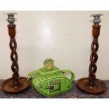 Green Staffordshire tea pot in the form of a WW2 tank and a pair of open barley-twist candlesticks