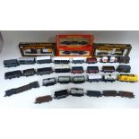 28 unboxed Hornby Mainline goods wagons, two boxed Hornby wagon (bolster) and two Mainline wagons (