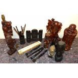 Carved oriental triptic, a quantity of various chopsticks, Asian and African carvings etc