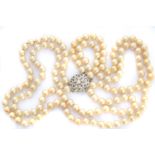 A diamond and imitation pearl necklace,