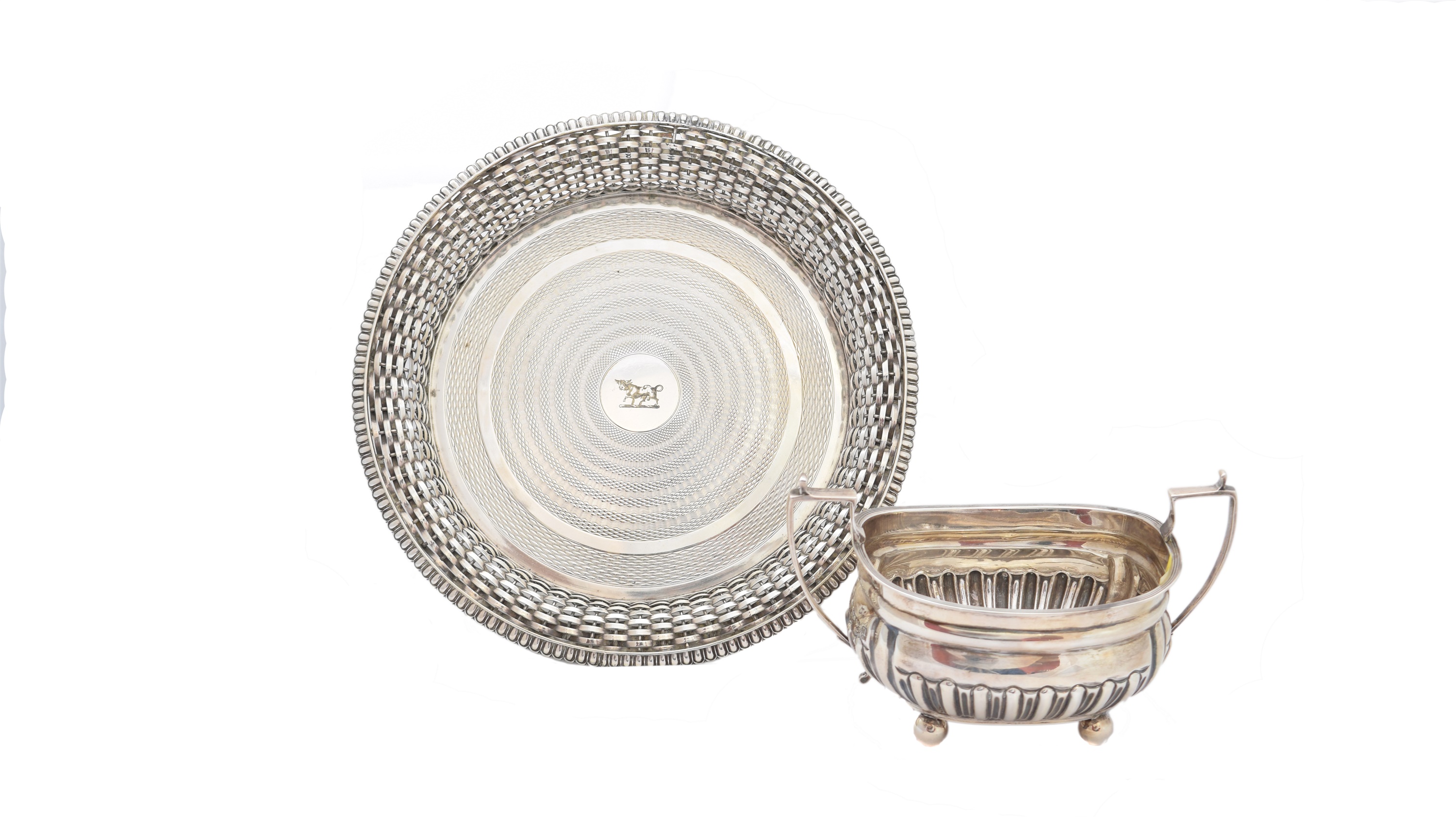 A Mappin & Webb silver sugar pot and plated tray,