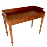 A Victorian mahogany tray top washstand, fitted two dummy drawers, raised on turned legs, width