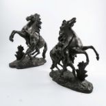 A pair of spelter models, of Marly horses, height 16ins
